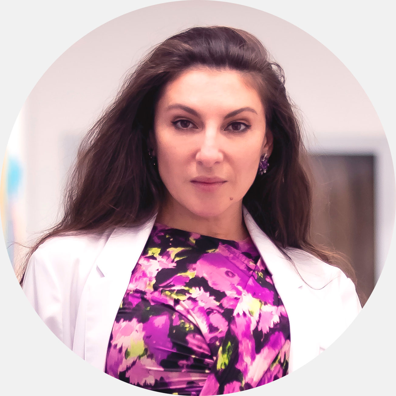 Dr. Angelina Postoev, a triple-board certified cosmetic surgeon in Atlanta